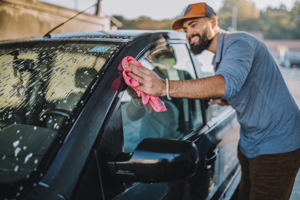 Man washing his car